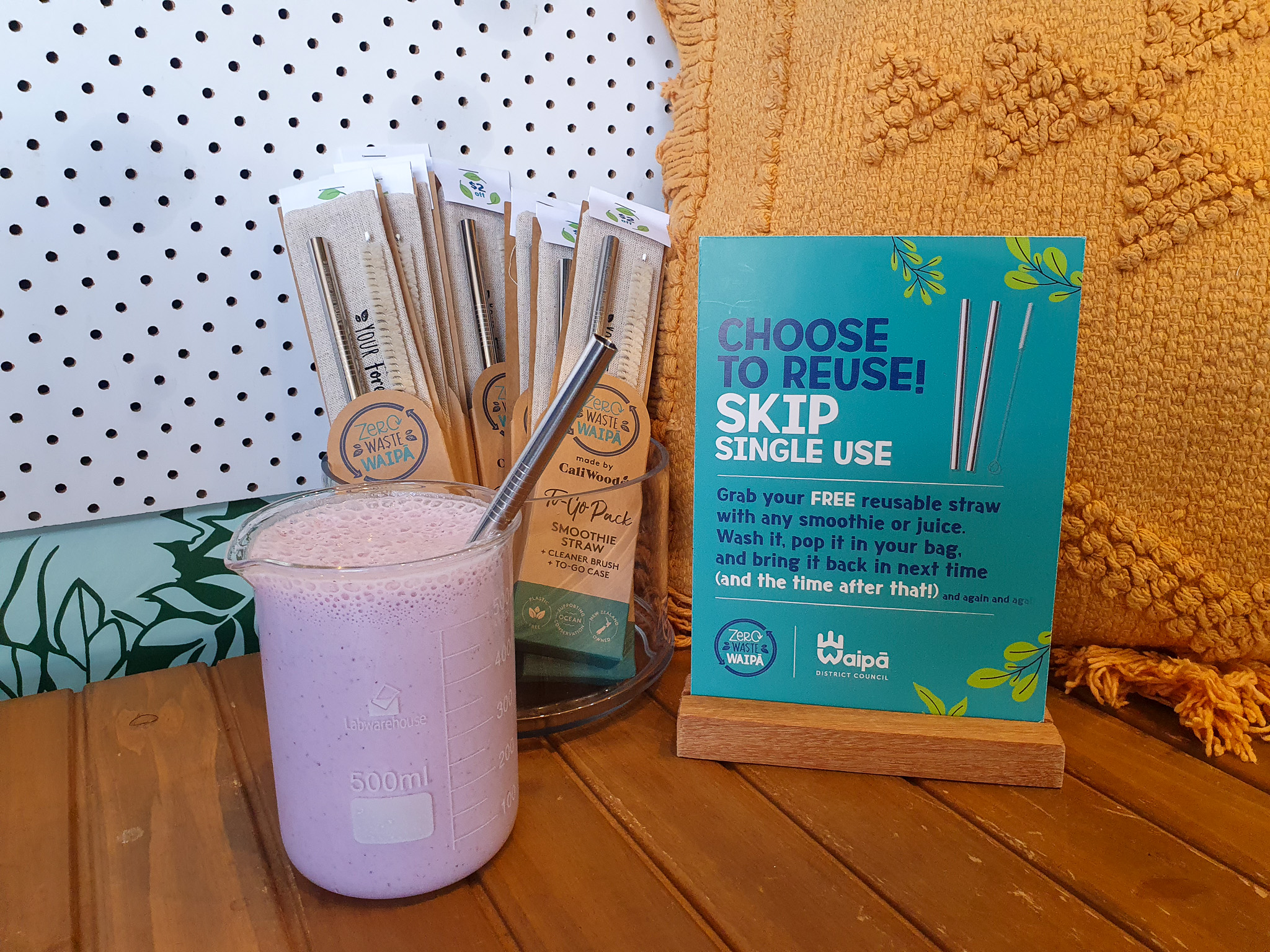 Reusable stainless straw in a smoothie cup 